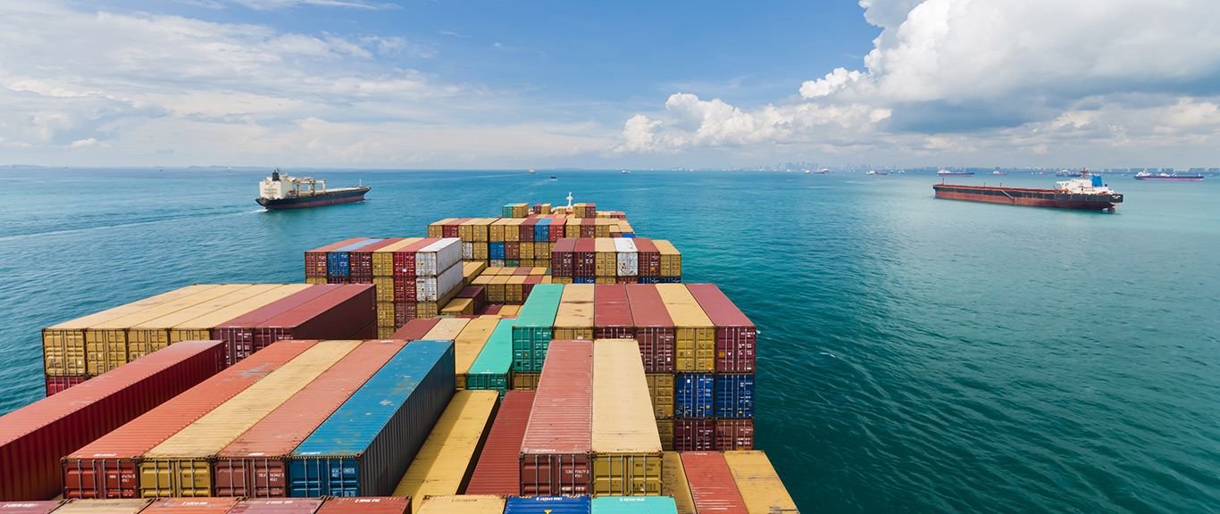 Container ship deck with stacked containers