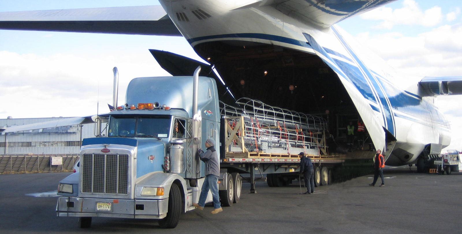 Truck being loaded from a cargo aircraft